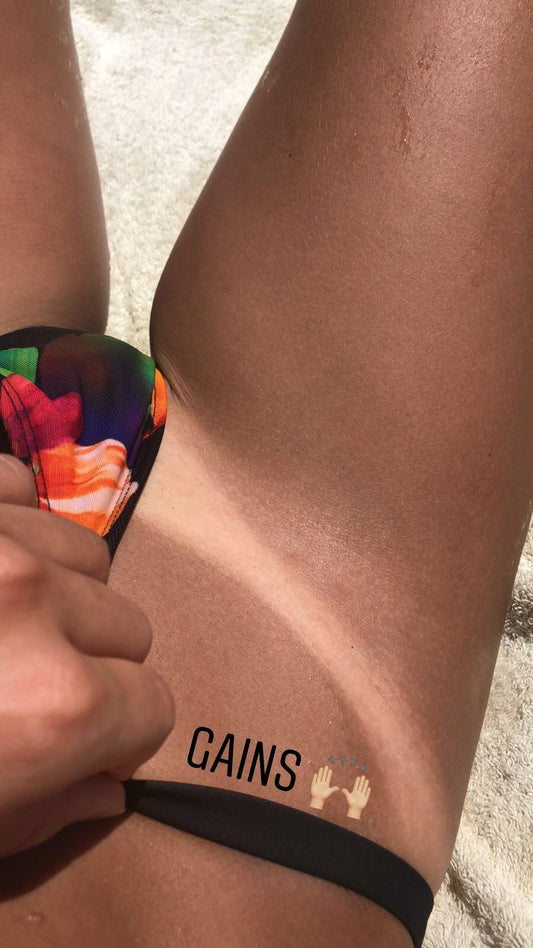 Tanmaxxing Explained: The Viral 2026 Tanning Trend (and How to Tan Smarter)